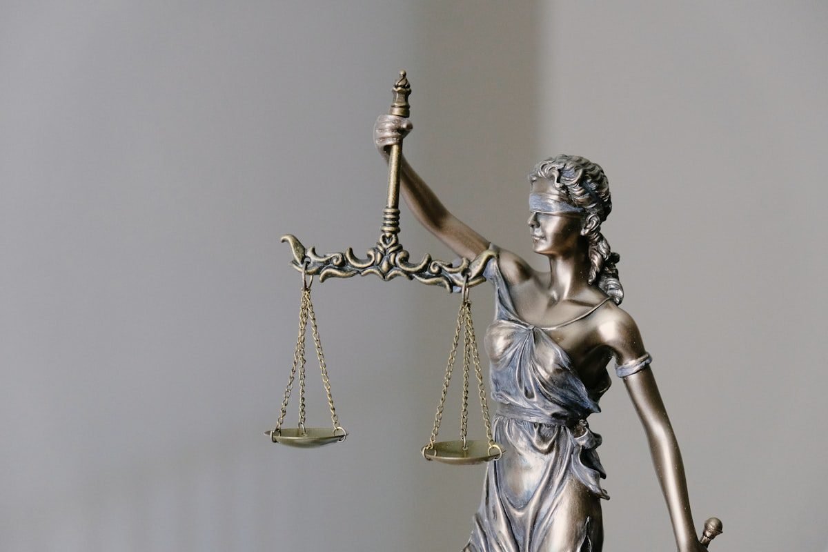 Law books and scales of justice representing Rajasthan judicial services civil judge recruitment